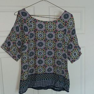 Shirt with cut out sleeves